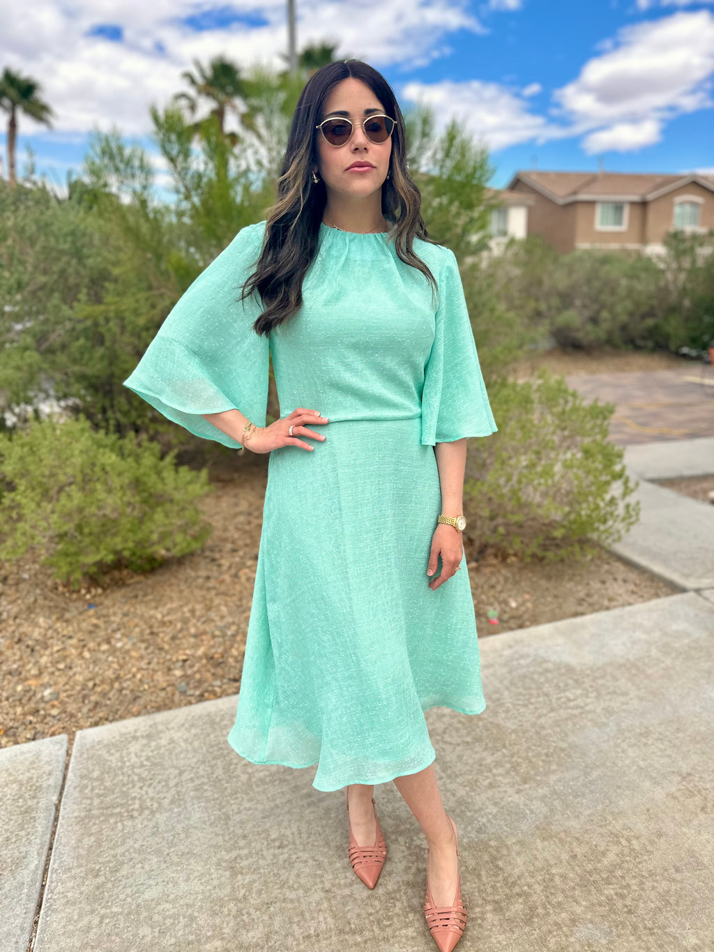 Soft Flared Dress with Gathered Neckline and Voluminous Sleeves