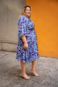 Soft Flared Dress with Gathered Neckline and Voluminous Sleeves